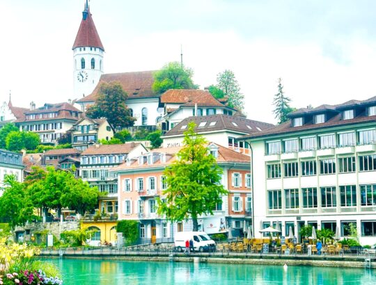 Walkway along the River Aare offers views of the Old City and the church.