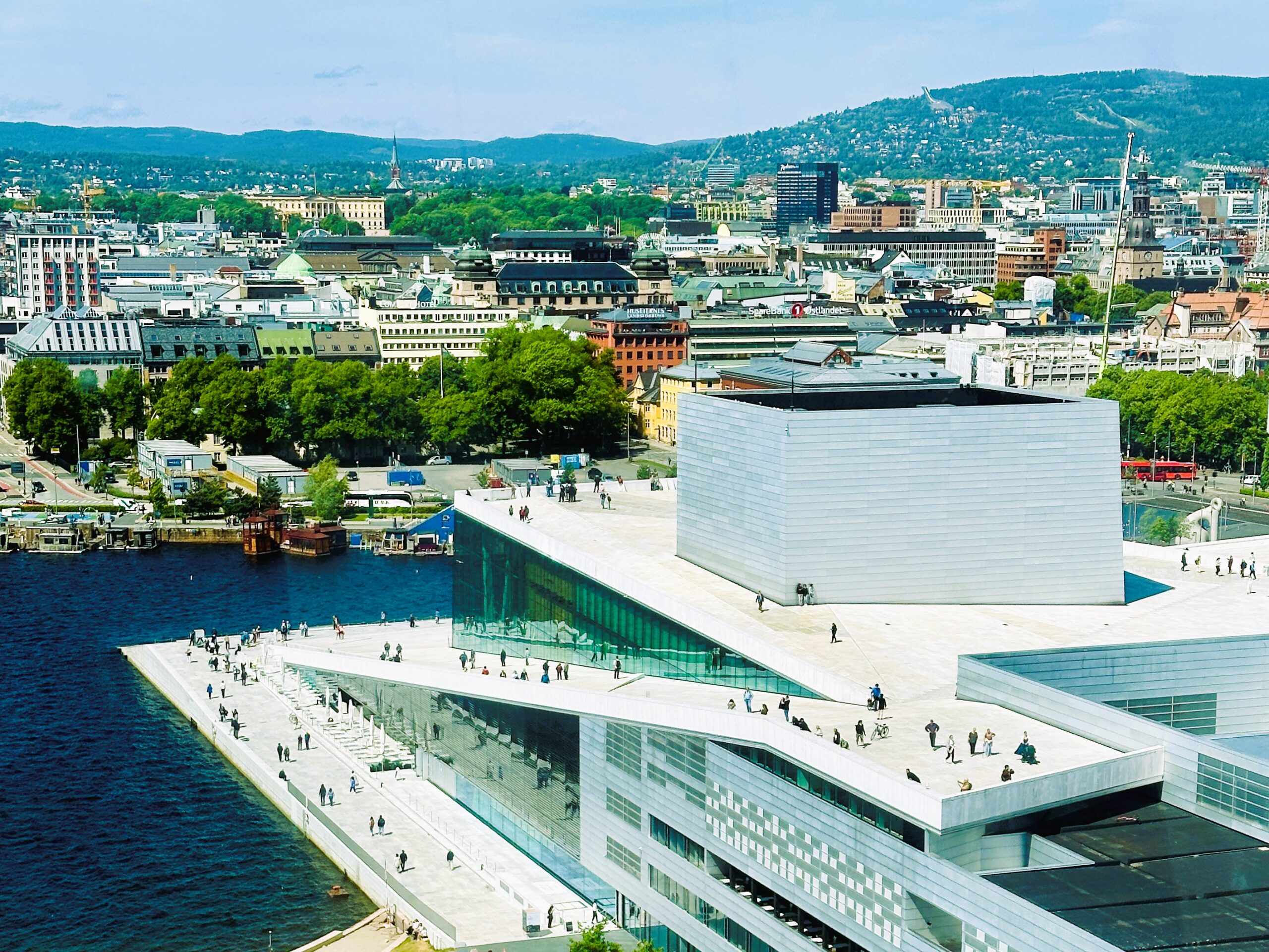 Pedestrian walking the roof of Oslo's National Opera house.
